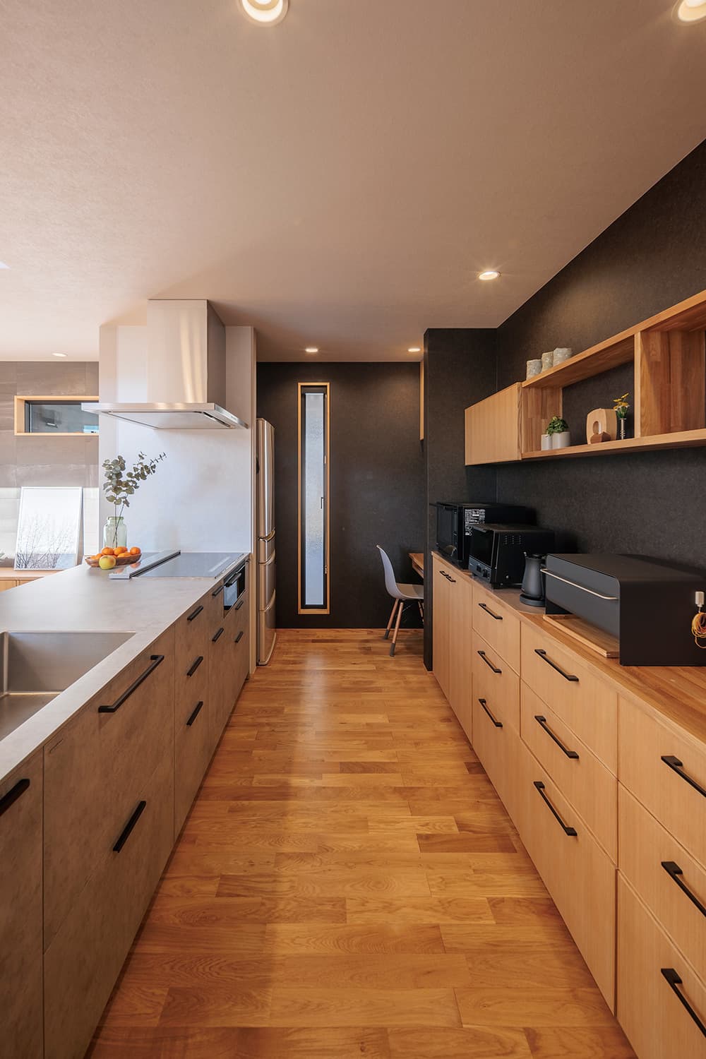 敷地条件を有効利用した中庭のあるコの字の家