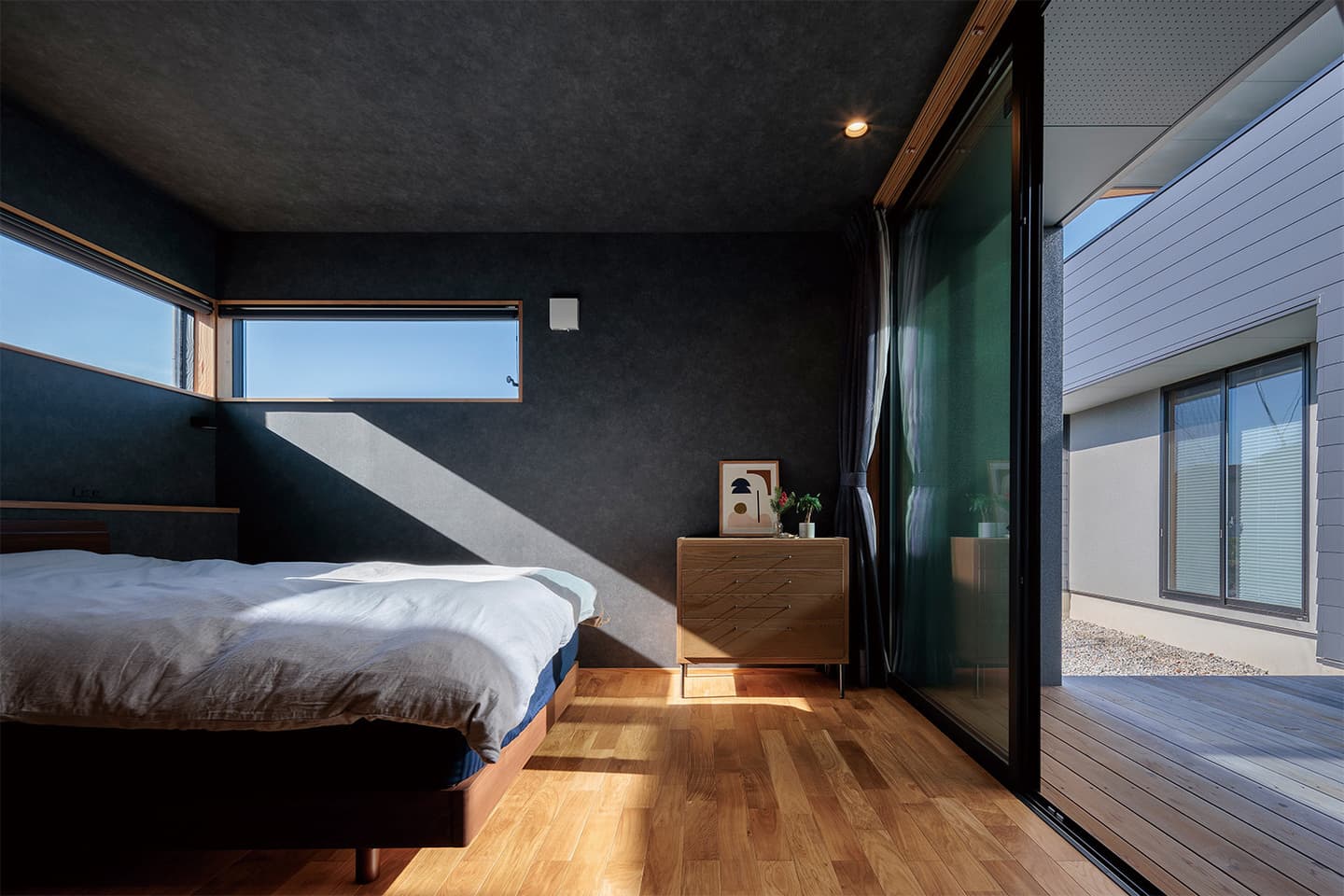 敷地条件を有効利用した中庭のあるコの字の家